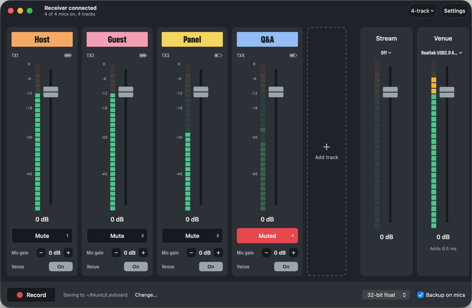 Lavboard mixing four wireless mics labelled Host, Guest, Panel and Q&A